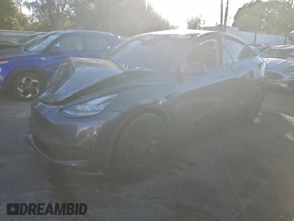 ✅ 2022 Tesla Model Y Long Range • VIN: 7SAYGDEEXNF494874 • Lot: 92753675. Listed on Copart with Not provided. Free auction sales archive from the USA and detailed vehicle history report at DreamBid. Image 1.