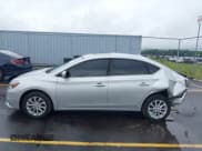 ✅ 2017 Nissan Sentra SL • VIN: 3N1AB7AP3HY323823 • Lot: 42994856. Listed on IAAI with 164,031 mi. Free auction sales archive from the USA and detailed vehicle history report at DreamBid. Image 13.