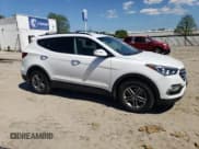✅ 2018 Hyundai Santa Fe 2.4L • VIN: 5NMZU3LB0JH060954 • Лот: 51750544. Опубликован ранее на Copart с пробегом 123 970 миль. Бесплатный доступ к архиву аукционных продаж из США и подробный отчёт об истории автомобиля на DreamBid. Изображение 4.