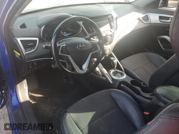 ✅ 2014 Hyundai Veloster • VIN: KMHTC6AD4EU218270 • Lot: 75559764. Wystawiony na Copart z przebiegiem 106 974 mil. Bezpłatny archiwum sprzedaży aukcyjnych z USA i szczegółowy raport historii pojazdu na DreamBid. Zdjęcie 8.