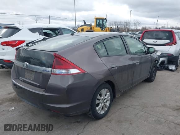 ✅ 2013 Honda Insight EX • VIN: JHMZE2H73DS006700 • Lot: 43779001. Listed on IAAI with 154,151 mi. Free auction sales archive from the USA and detailed vehicle history report at DreamBid. Image 4.