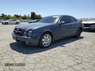 ✅ 1998 Mercedes-Benz CLK 320/430 • VIN: WDBLJ65G8WF021251 • Lot: 58581315. Listed on Copart with 216,422 mi. Free auction sales archive from the USA and detailed vehicle history report at DreamBid. Image 1.