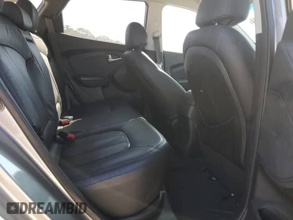 2013 Hyundai Tucson GLS z VIN KM8JU3ACXDU579530, wystawiony jako Copart lot #74814144 z przebiegiem 140 443 mil mil oraz Szkoda całkowita • Salvage title. Historia ofert i sprzedaży dostępna na DreamBid. Obrazek 11.