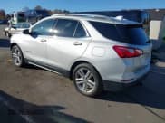 ✅ 2018 Chevrolet Equinox Premier • VIN: 2GNAXVEV6J6312308 • Лот: 43537199. Опубликован ранее на IAAI с пробегом 169 894 миль. Бесплатный доступ к архиву аукционных продаж из США и подробный отчёт об истории автомобиля на DreamBid. Изображение 3.