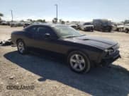 ✅ 2013 Dodge Challenger SXT • VIN: 2C3CDYAG1DH691640 • Lot: 77842744. Wystawiony na Copart z przebiegiem 181 343 mil. Bezpłatny archiwum sprzedaży aukcyjnych z USA i szczegółowy raport historii pojazdu na DreamBid. Zdjęcie 4.
