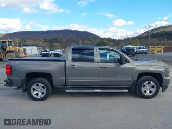 ✅ 2017 Chevrolet Silverado 1500 LT • VIN: 3GCUKREC8HG168351 • Lot: 43592900. Listed on IAAI with 144,711 mi. Free auction sales archive from the USA and detailed vehicle history report at DreamBid. Image 14.