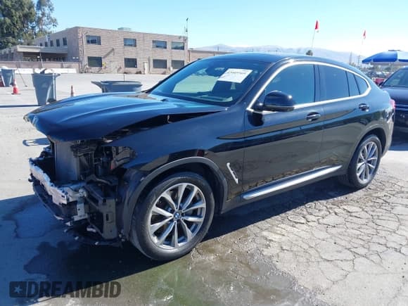 ✅ 2019 BMW X4 xDrive30i • VIN: 5UXUJ3C59KLG55302 • Lot: 43405569. Listed on IAAI with 77,401 mi. Free auction sales archive from the USA and detailed vehicle history report at DreamBid. Image 2.