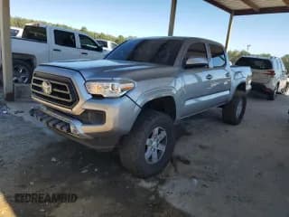 ✅ 2021 Toyota Tacoma SR • VIN: 5TFCZ5AN5MX262734 • Lot: 82406865. Listed on Copart with 107,393 mi. Free auction sales archive from the USA and detailed vehicle history report at DreamBid. Image 1.