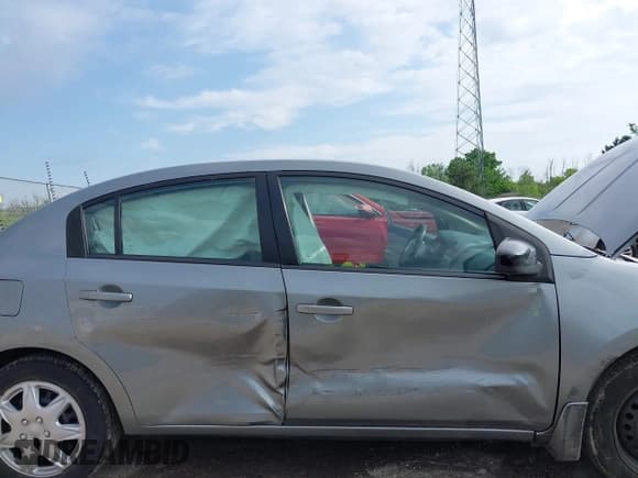 ✅ 2009 Nissan Sentra FE+ • VIN: 3N1AB61E19L645173 • Лот: 42537698. Опубликован ранее на IAAI с пробегом 130 938 миль. Бесплатный доступ к архиву аукционных продаж из США и подробный отчёт об истории автомобиля на DreamBid. Изображение 6.