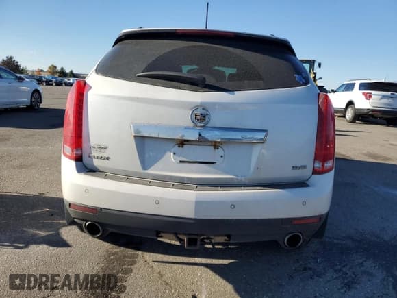 ✅ 2012 Cadillac SRX Performance Collection • VIN: 3GYFNBE3XCS620131 • Lot: 90749255. Listed on Copart with 172,653 mi. Free auction sales archive from the USA and detailed vehicle history report at DreamBid. Image 6.