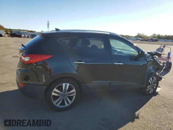 2015 Hyundai Tucson Limited with VIN KM8JUCAG0FU088325, listed as a Copart auction lot 82262885 with 66,470 mi miles and Salvage title. Bid and sale history available at DreamBid. Image 3.