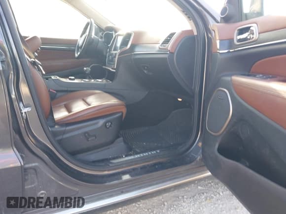 ✅ 2015 Jeep Grand Cherokee Summit • VIN: 1C4RJFJG4FC143379 • Lot: 43517755. Wystawiony na IAAI z przebiegiem 116 420 mil. Bezpłatny archiwum sprzedaży aukcyjnych z USA i szczegółowy raport historii pojazdu na DreamBid. Zdjęcie 5.