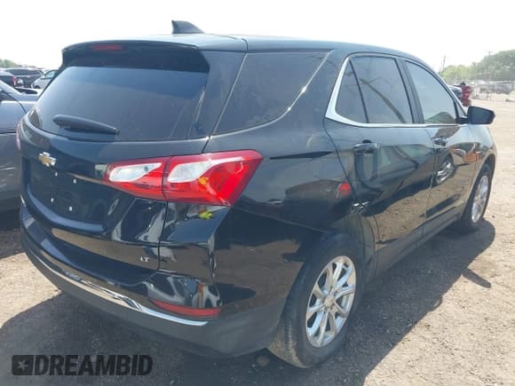 ✅ 2021 Chevrolet Equinox LT • VIN: 2GNAXKEV0M6127996 • Lot: 41918022. Listed on IAAI with 85,053 mi. Free auction sales archive from the USA and detailed vehicle history report at DreamBid. Image 4.