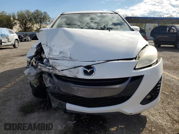 ✅ 2013 Mazda 5 Touring • VIN: JM1CW2CL2D0151635 • Лот: 85765165. Опубликован ранее на Copart с пробегом 194 381 миль. Бесплатный доступ к архиву аукционных продаж из США и подробный отчёт об истории автомобиля на DreamBid. Изображение 5.