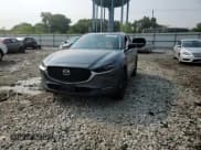 ✅ 2023 Mazda CX-30 Premium • VIN: 3MVDMBDY2PM579533 • Lot: 66742055. Wystawiony na Copart z przebiegiem Nie podano. Bezpłatny archiwum sprzedaży aukcyjnych z USA i szczegółowy raport historii pojazdu na DreamBid. Zdjęcie 14.