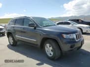 ✅ 2013 Jeep Grand Cherokee Laredo • VIN: 1C4RJFAG7DC645932 • Lot: 57969715. Listed on Copart with 165,717 mi. Free auction sales archive from the USA and detailed vehicle history report at DreamBid. Image 14.