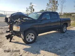 2008 Dodge Dakota Bighorn/Lonestar with VIN 1D7HE38KX8S570119, listed as a Copart auction lot 74081024 with 129,665 mi miles and Salvage title. Bid and sale history available at DreamBid. Image 1.