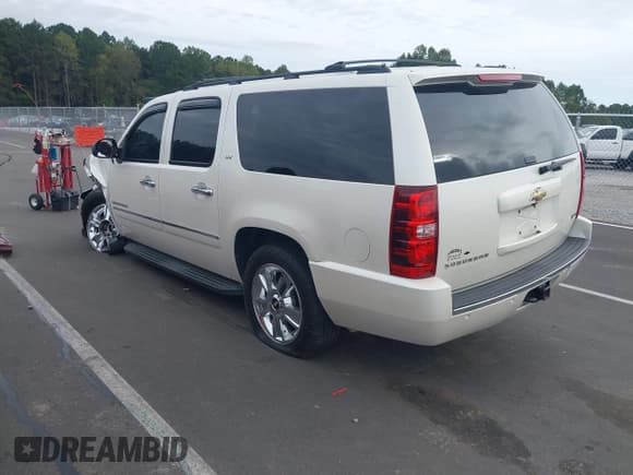 ✅ 2010 Chevrolet Suburban LTZ • VIN: 1GNUKKE35AR165749 • Lot: 43431739. Listed on IAAI with 221,583 mi. Free auction sales archive from the USA and detailed vehicle history report at DreamBid. Image 3.
