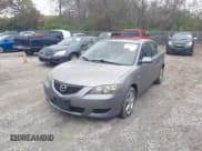 ✅ 2006 Mazda 3 i • VIN: JM1BK12F961465857 • Lot: 43696357. Listed on IAAI with 236,659 mi. Free auction sales archive from the USA and detailed vehicle history report at DreamBid. Image 2.