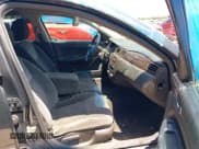 ✅ 2014 Chevrolet Impala LT • VIN: 2G1WB5E38E1187433 • Lot: 42439170. Listed on IAAI with 129,751 mi. Free auction sales archive from the USA and detailed vehicle history report at DreamBid. Image 5.