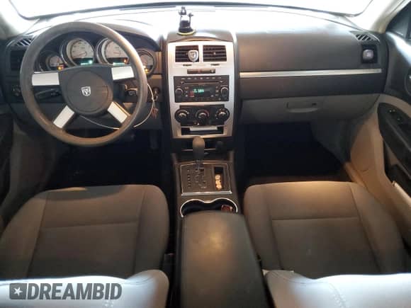 2009 Dodge Charger SXT z VIN 2B3KA33V39H573080, wystawiony jako Copart lot #77794044 z przebiegiem 117 601 mil mil oraz Szkoda całkowita • Salvage title. Historia ofert i sprzedaży dostępna na DreamBid. Obrazek 8.