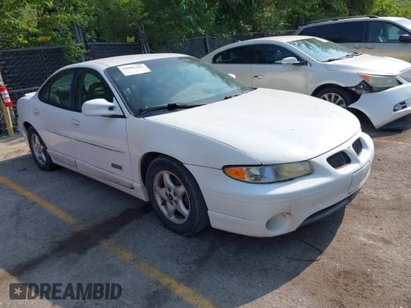 ✅ 1999 Pontiac Grand Prix GTP • VIN: 1G2WR5215XF312975 • Lot: 39985242. Listed on IAAI with 243,125 mi. Free auction sales archive from the USA and detailed vehicle history report at DreamBid. Image 1.