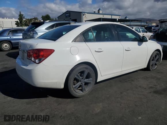 ✅ 2015 Chevrolet Cruze LT • VIN: 1G1PE5SB9F7190157 • Lot: 82216965. Listed on Copart with 143,860 mi. Free auction sales archive from the USA and detailed vehicle history report at DreamBid. Image 3.