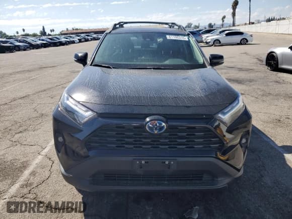 ✅ 2023 Toyota RAV4 Hybrid Woodland • VIN: 2T3UWRFV1PW169411 • Лот: 81106315. Опубликован ранее на Copart с пробегом 133 006 миль. Бесплатный доступ к архиву аукционных продаж из США и подробный отчёт об истории автомобиля на DreamBid. Изображение 5.