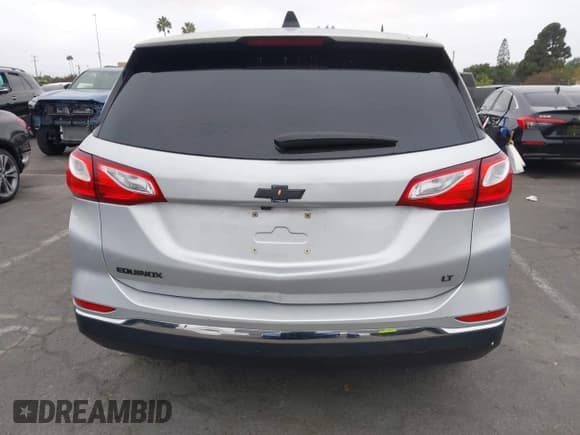 ✅ 2018 Chevrolet Equinox LT • VIN: 2GNAXJEV2J6277033 • Lot: 43378314. Listed on IAAI with 101,324 mi. Free auction sales archive from the USA and detailed vehicle history report at DreamBid. Image 17.