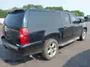 2014 Chevrolet Suburban LT z VIN 1GNSKJE72ER100836, wystawiony jako IAAI lot #42378709 z przebiegiem 365 946 mil mil oraz . Historia ofert i sprzedaży dostępna na DreamBid. Obrazek 4.