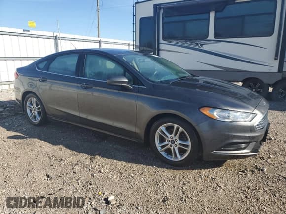 ✅ 2018 Ford Fusion SE • VIN: 3FA6P0H79JR152065 • Лот: 46472035. Опубликован ранее на Copart с пробегом Не указан. Бесплатный доступ к архиву аукционных продаж из США и подробный отчёт об истории автомобиля на DreamBid. Изображение 4.