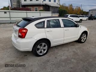 ✅ 2010 Dodge Caliber Mainstreet • VIN: 1B3CB3HA9AD616636 • Лот: 76910894. Опубликован ранее на Copart с пробегом 80 968 миль. Бесплатный доступ к архиву аукционных продаж из США и подробный отчёт об истории автомобиля на DreamBid. Изображение 3.