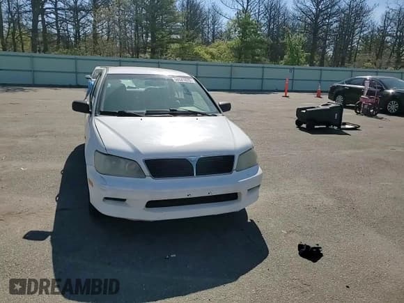 ✅ 2003 Mitsubishi Lancer ES • VIN: JA3AJ26E83U076335 • Лот: 67506825. Опубликован ранее на Copart с пробегом 143 394 миль. Бесплатный доступ к архиву аукционных продаж из США и подробный отчёт об истории автомобиля на DreamBid. Изображение 13.