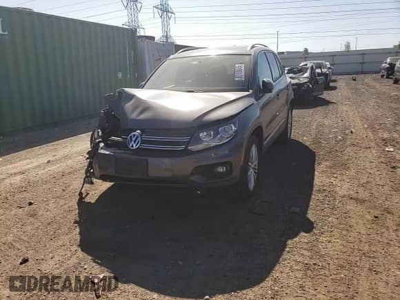 2013 Volkswagen Tiguan SE z VIN WVGAV7AX7DW018388, wystawiony jako Copart lot #56188045 z przebiegiem 98 066 mil mil oraz Szkoda całkowita • Salvage title. Historia ofert i sprzedaży dostępna na DreamBid. Obrazek 13.