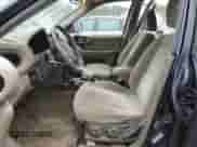 2004 Hyundai Santa Fe GLS z VIN KM8SC73DX4U770675, wystawiony jako Copart lot #70331224 z przebiegiem 134 785 mil mil oraz Czysty tytuł • Clean title. Historia ofert i sprzedaży dostępna na DreamBid. Obrazek 7.