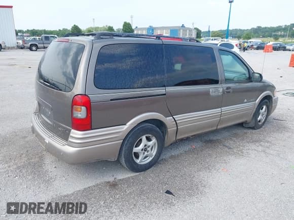 ✅ 2003 Pontiac Montana w/1SE Pkg • VIN: 1GMDX13EX3D179859 • Lot: 42397902. Wystawiony na IAAI z przebiegiem Nie podano. Bezpłatny archiwum sprzedaży aukcyjnych z USA i szczegółowy raport historii pojazdu na DreamBid. Zdjęcie 4.