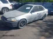 ✅ 1998 Honda Civic LX • VIN: 2HGEJ6578WH527589 • Лот: 42595571. Опубликован ранее на IAAI с пробегом 300 032 миль. Бесплатный доступ к архиву аукционных продаж из США и подробный отчёт об истории автомобиля на DreamBid. Изображение 2.