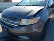 ✅ 2012 Honda Odyssey Touring • VIN: 5FNRL5H94CB106763 • Лот: 43309470. Опубликован ранее на IAAI с пробегом 154 794 миль. Бесплатный доступ к архиву аукционных продаж из США и подробный отчёт об истории автомобиля на DreamBid. Изображение 6.