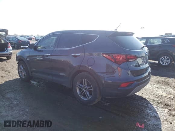 ✅ 2018 Hyundai Santa Fe 2.4L • VIN: 5NMZT3LBXJH095570 • Лот: 39864404. Опубликован ранее на Copart с пробегом 39 191 миль. Бесплатный доступ к архиву аукционных продаж из США и подробный отчёт об истории автомобиля на DreamBid. Изображение 2.