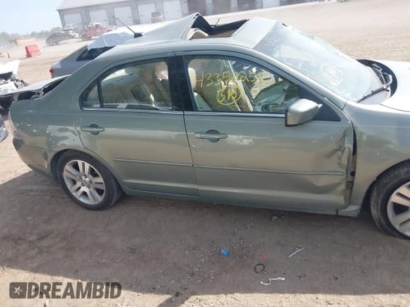 ✅ 2009 Ford Fusion SEL • VIN: 3FAHP08Z19R170808 • Лот: 43352259. Опубликован ранее на IAAI с пробегом 111 141 миль. Бесплатный доступ к архиву аукционных продаж из США и подробный отчёт об истории автомобиля на DreamBid. Изображение 14.