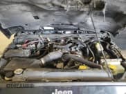 ✅ 2008 Jeep Wrangler Unlimited Sahara • VIN: 1J4GA59108L621845 • Lot: 54491035. Listed on Copart with 152,815 mi. Free auction sales archive from the USA and detailed vehicle history report at DreamBid. Image 12.