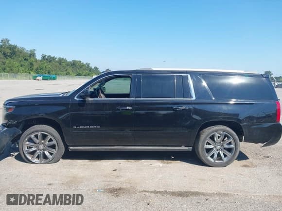 ✅ 2015 Chevrolet Suburban LTZ • VIN: 1GNSKKKC6FR234435 • Lot: 43245135. Listed on IAAI with 189,693 mi. Free auction sales archive from the USA and detailed vehicle history report at DreamBid. Image 14.