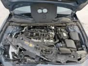 ✅ 2024 Mazda 3 S Carbon Edition • VIN: 3MZBPBCM0RM411159 • Лот: 63127795. Опубликован ранее на Copart с пробегом 35 318 миль. Бесплатный доступ к архиву аукционных продаж из США и подробный отчёт об истории автомобиля на DreamBid. Изображение 11.