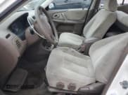 ✅ 2000 Mazda Protege DX • VIN: JM1BJ2223Y0295154 • Lot: 79511954. Wystawiony na Copart z przebiegiem 116 781 mil. Bezpłatny archiwum sprzedaży aukcyjnych z USA i szczegółowy raport historii pojazdu na DreamBid. Zdjęcie 7.