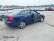 ✅ 2006 Kia Optima LX • VIN: KNAGE123465073250 • Lot: 42469136. Wystawiony na IAAI z przebiegiem 126 445 mil. Bezpłatny archiwum sprzedaży aukcyjnych z USA i szczegółowy raport historii pojazdu na DreamBid. Zdjęcie 4.