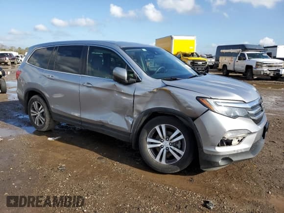 ✅ 2018 Honda Pilot EX-L • VIN: 5FNYF5H67JB002287 • Lot: 84826144. Listed on Copart with 129,280 mi. Free auction sales archive from the USA and detailed vehicle history report at DreamBid. Image 4.