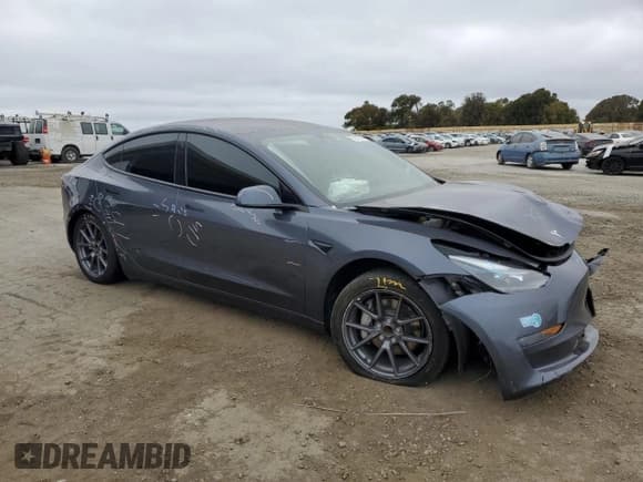 ✅ 2023 Tesla Model 3 • VIN: 5YJ3E1EA9PF447430 • Lot: 59084005. Listed on Copart with 81,198 mi. Free auction sales archive from the USA and detailed vehicle history report at DreamBid. Image 4.