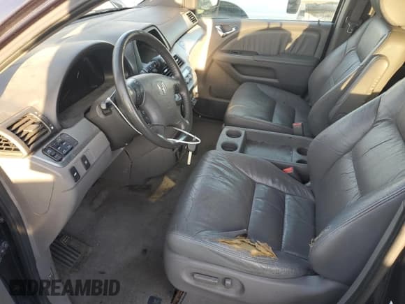 ✅ 2009 Honda Odyssey EX-L • VIN: 5FNRL387X9B411700 • Lot: 90916965. Wystawiony na Copart z przebiegiem 239 517 mil. Bezpłatny archiwum sprzedaży aukcyjnych z USA i szczegółowy raport historii pojazdu na DreamBid. Zdjęcie 7.