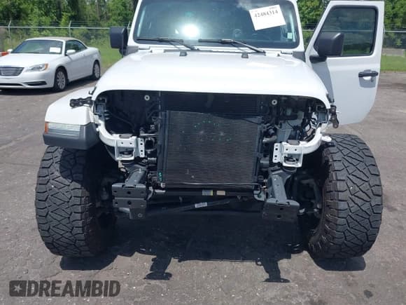 ✅ 2021 Jeep Wrangler Unlimited Sahara Altitude • VIN: 1C4HJXEN7MW518395 • Lot: 42484314. Listed on IAAI with 55,000 mi. Free auction sales archive from the USA and detailed vehicle history report at DreamBid. Image 6.