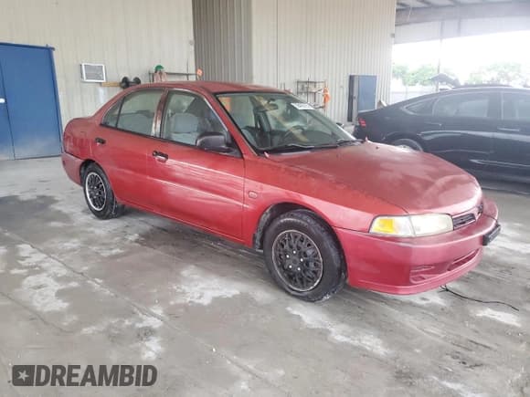 ✅ 2001 Mitsubishi Mirage ES • VIN: JA3AY26C71U028803 • Lot: 59489765. Listed on Copart with Not provided. Free auction sales archive from the USA and detailed vehicle history report at DreamBid. Image 4.